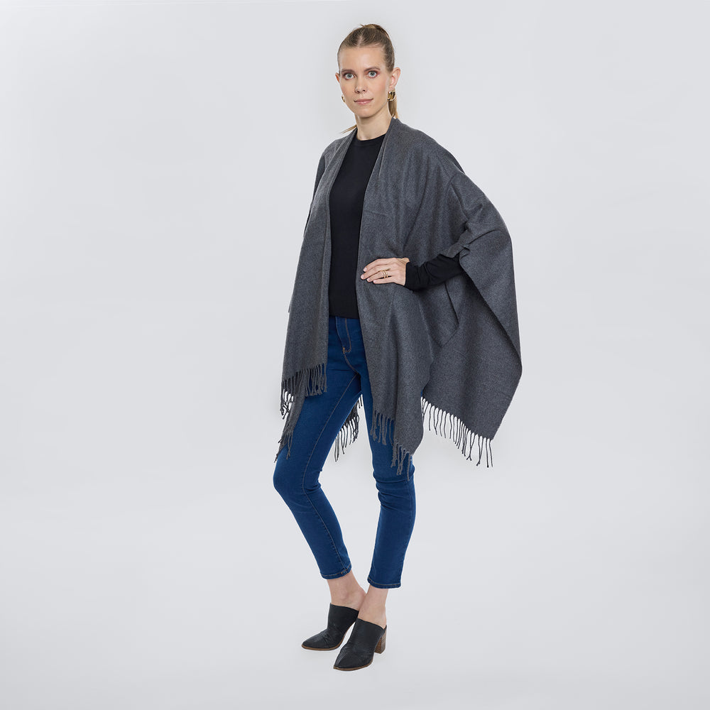 
                      
                        Poncho Tacto Suave Flecos
                      
                    