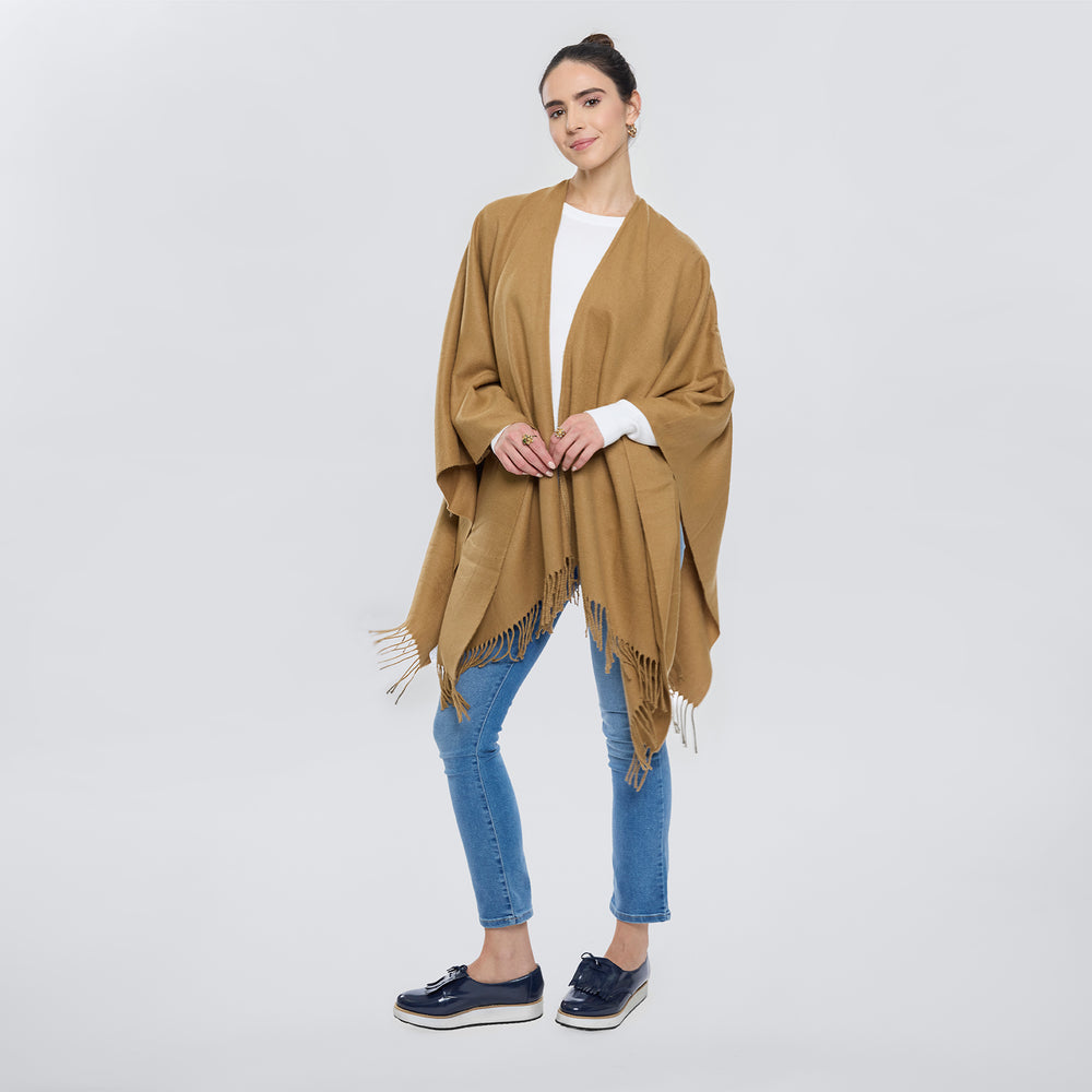 
                      
                        Poncho Tacto Suave Flecos
                      
                    