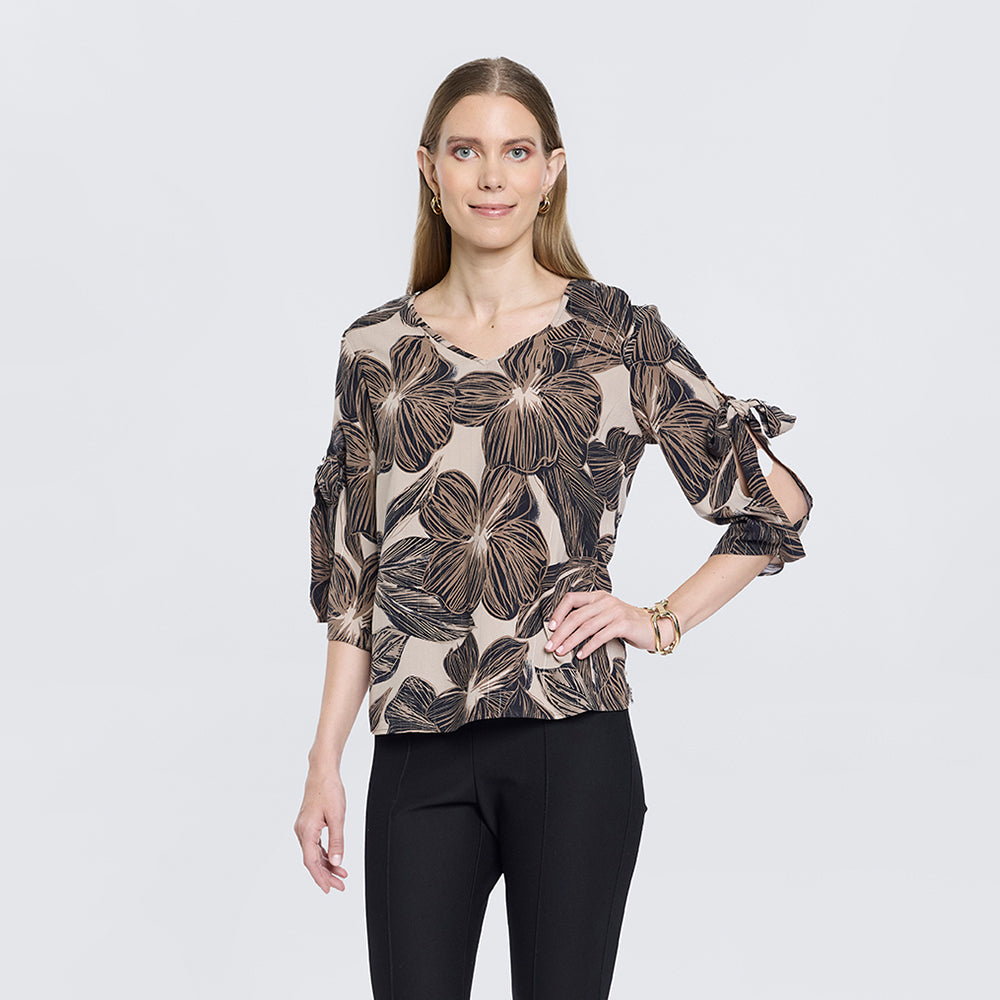 
                      
                        Top Floral Nudo
                      
                    